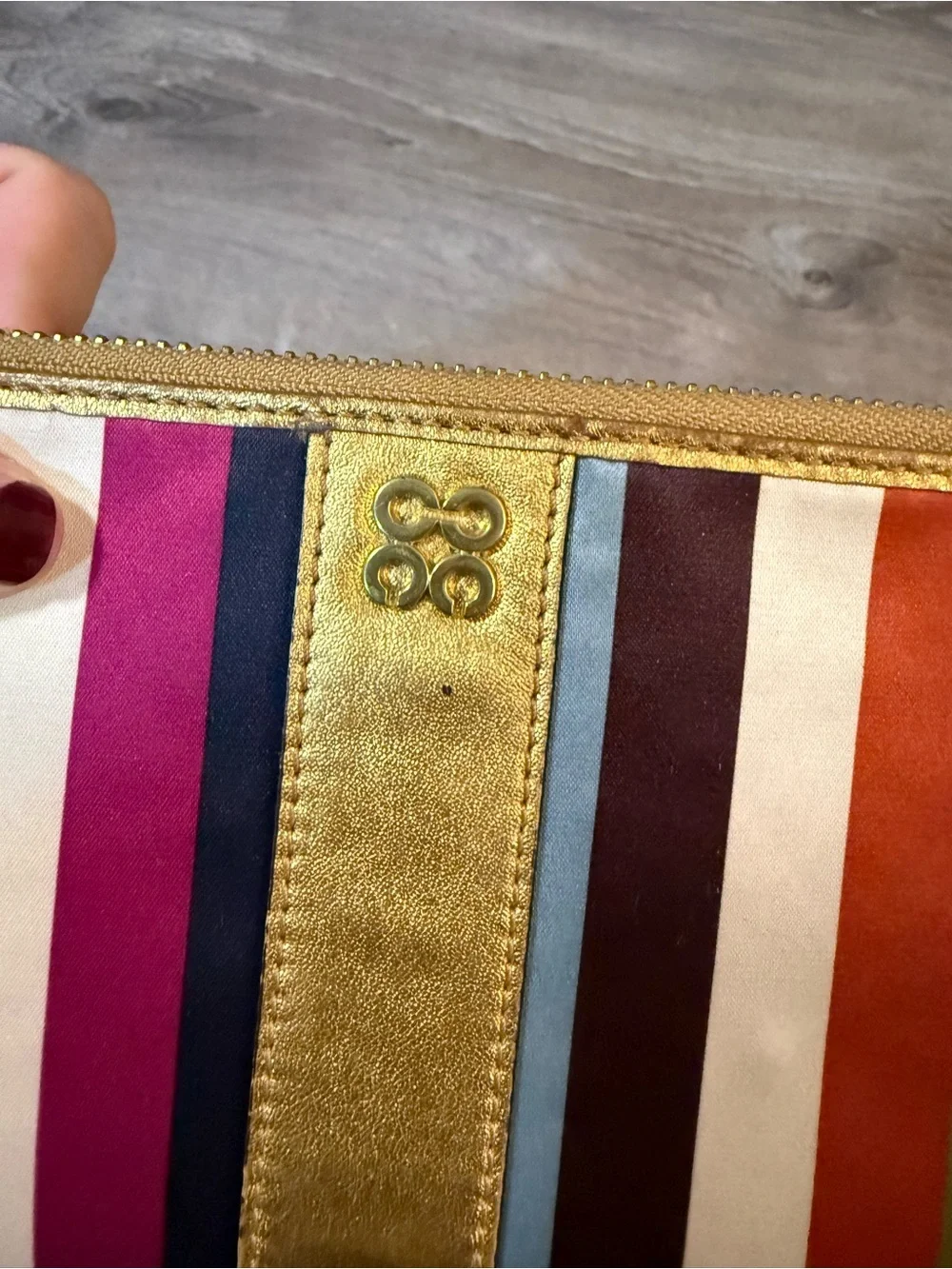 Coach Legacy multi color stripe wristlet